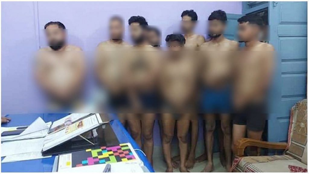The photo that surfaced on social media showed eight men stripped semi-naked in what appeared to be a police station | Twitter