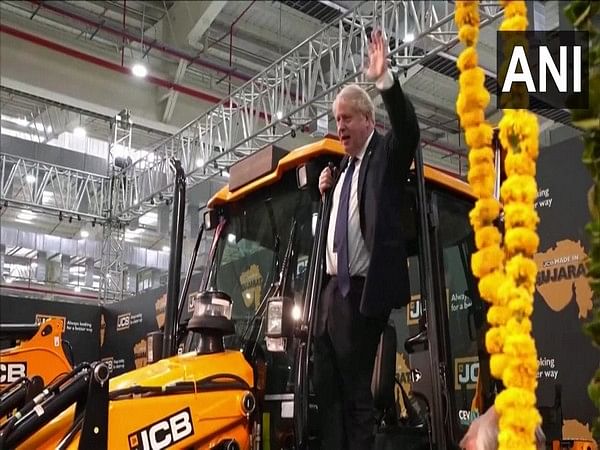British PM hops on to bulldozer at Gujarat JCB factory, sparks meme fest