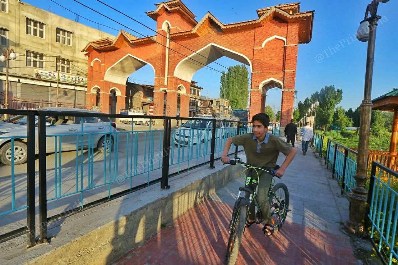 A boy cycling in downtown Srinagar | Praveen Jain | ThePrint