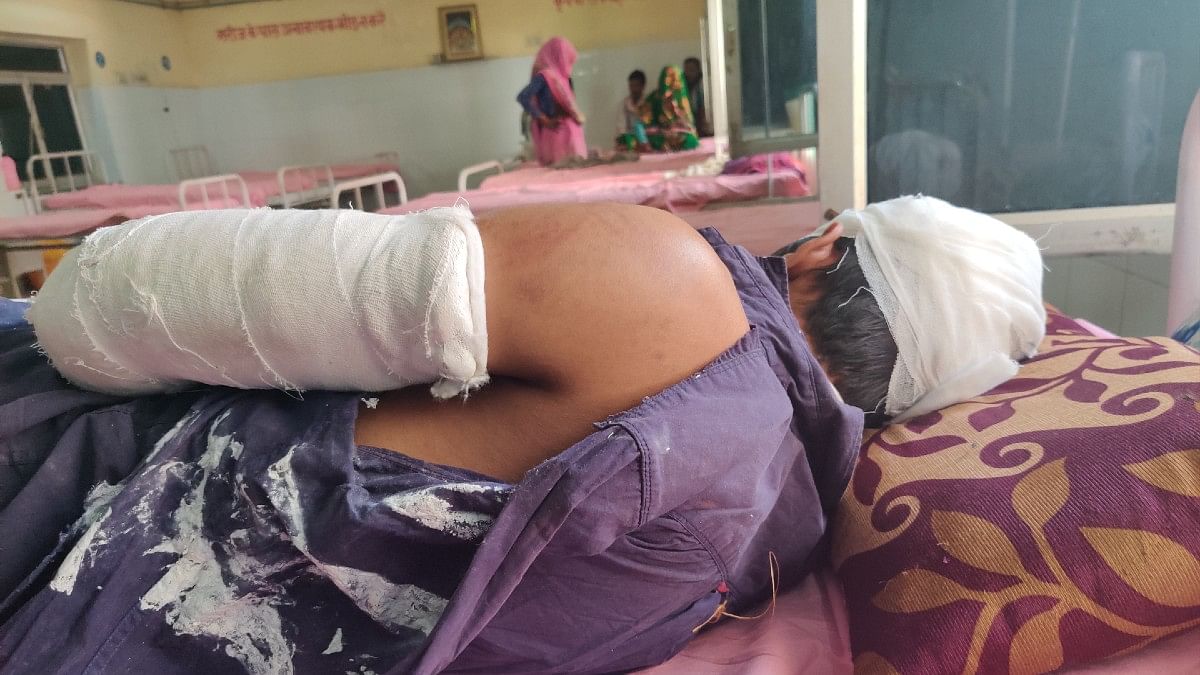 Akhilesh Parashar, 26, who was injured in the violence, at Karauli district hospital | Bismee Taskin | ThePrint