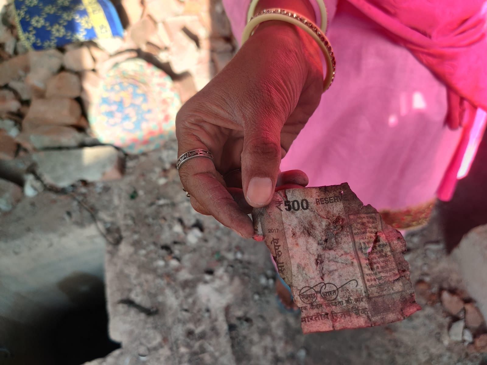 Charred currency note in riot-hit Sanjay Nagar. | Photo: Bismee Taskin | ThePrint