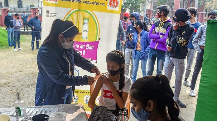 Representational image | A girl receives a dose of Covid vaccine during a vaccination drive in New Delhi | ANI Photo