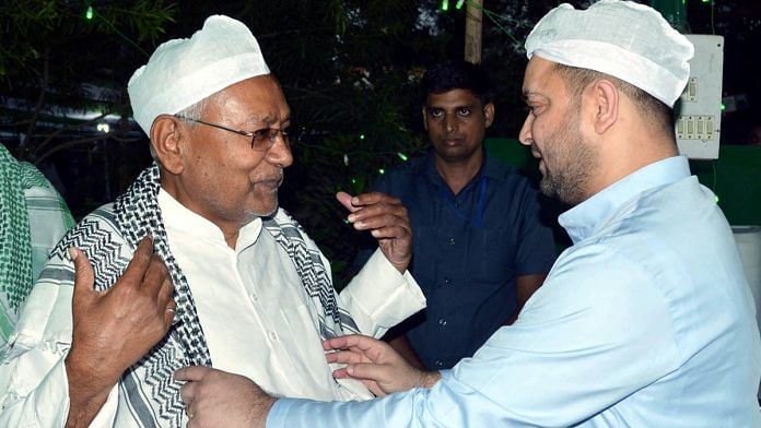 Bihar CM Nitish Kumar with RJD leader Tejashwi Yadav at the latter's Iftaar party. | ANI