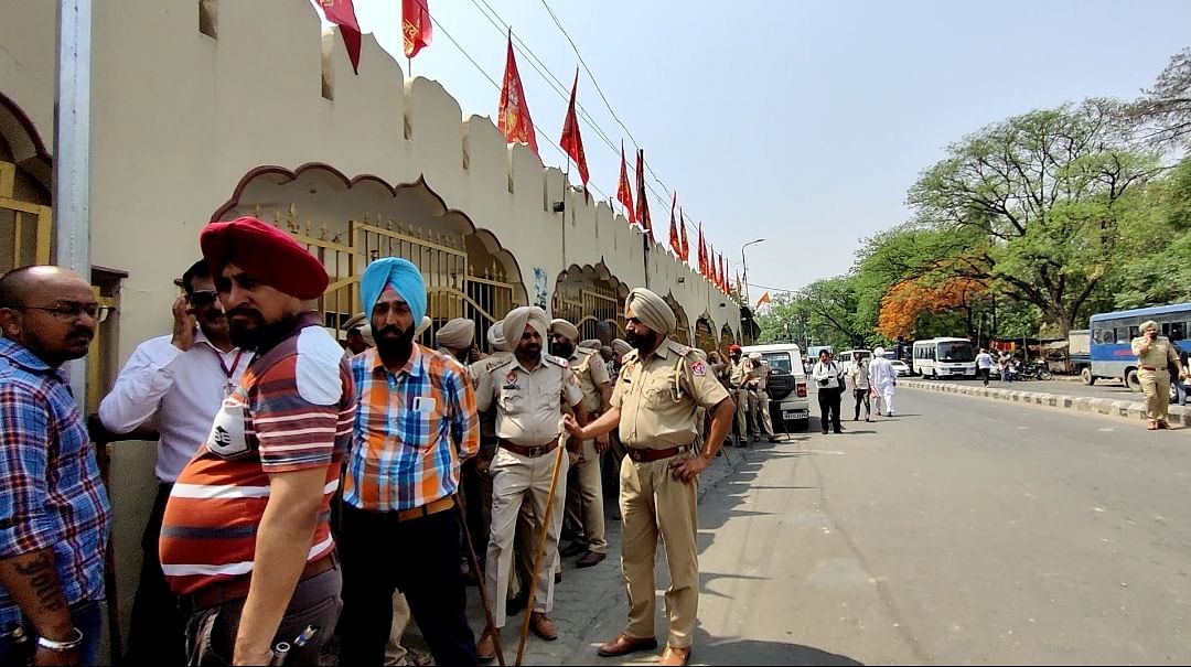 Police deployed outside the temple where violence was reported on Friday. | Urjita Bhardwaj