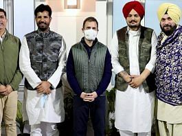 File photo of Congress leader Rahul Gandhi and then Punjab Congress president Navjot Sidhu with singer Sidhu Moose Wala (2nd from right) in Delhi last year | ANI
