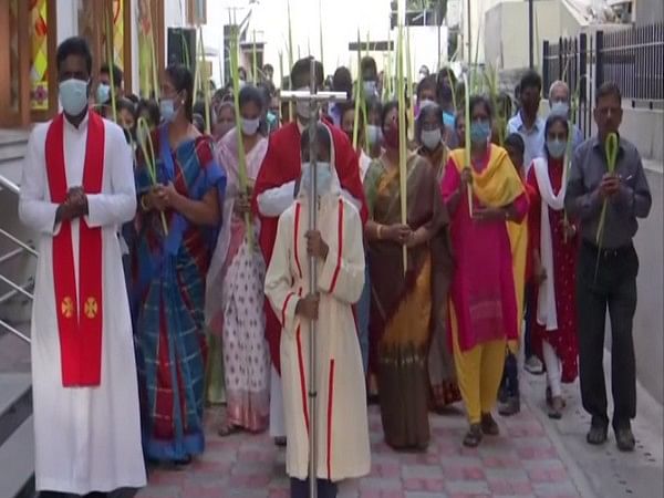 Devotees offer prayers at St.Luke's Church in Chennai on Palm Sunday 