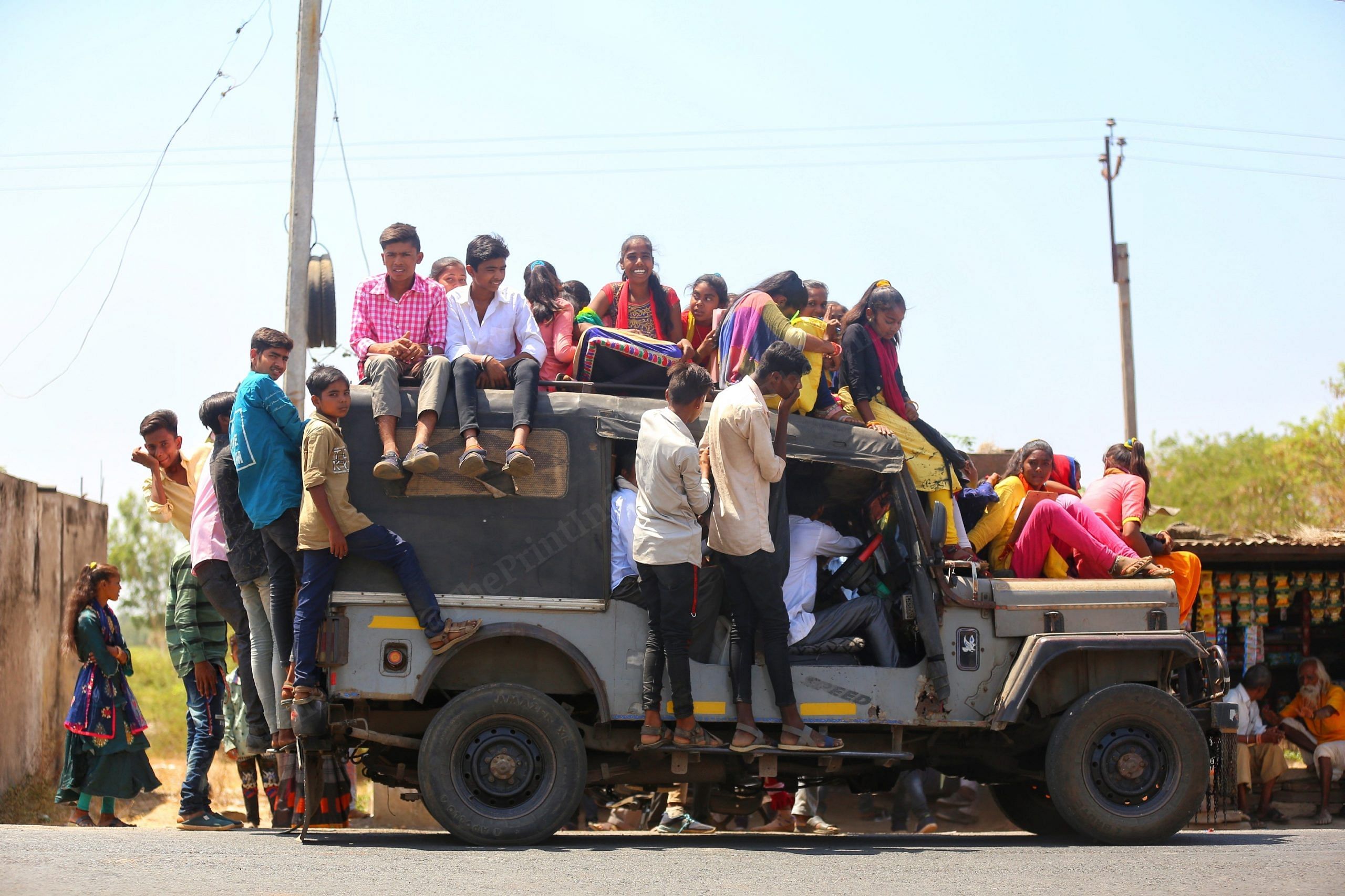 Students in Mahisagar district travel to school in an overcrowded public transport, paying five rupees for one way | Photo: Manisha Mondal |ThePrint