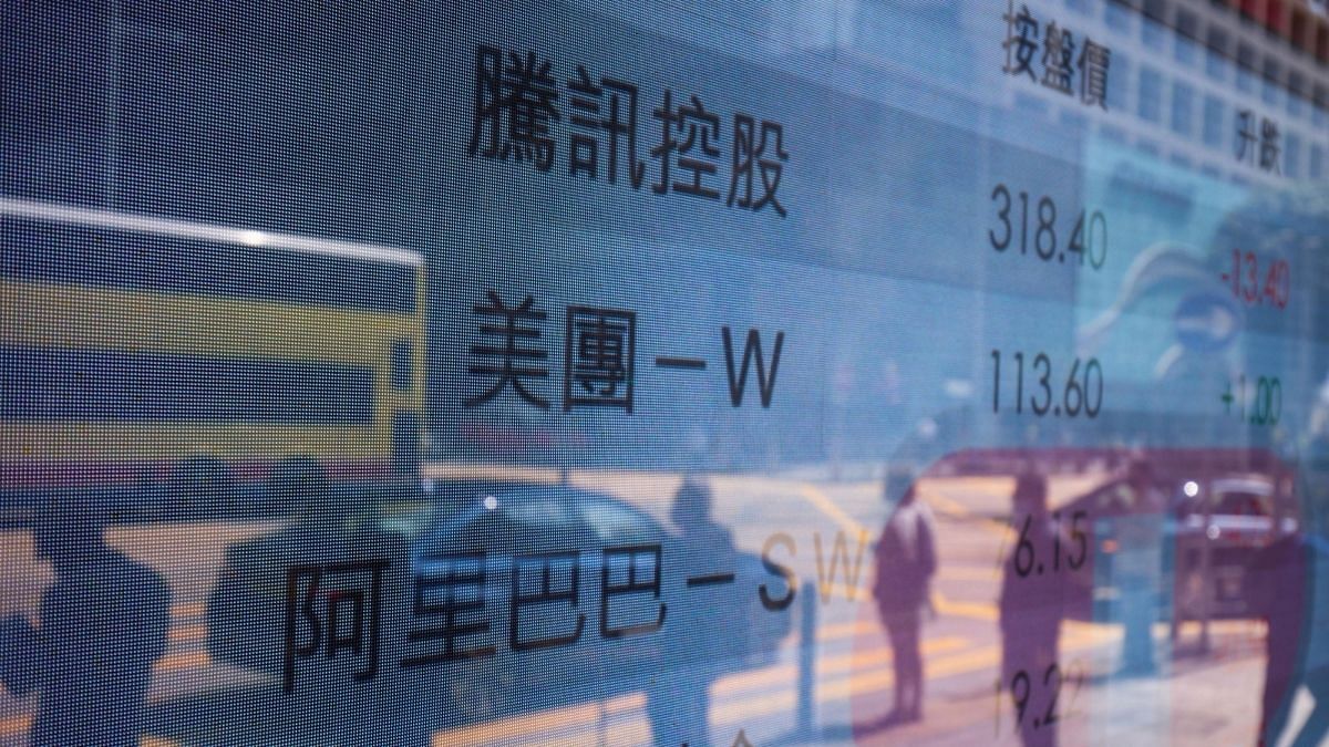 An electronic screen displays the stock figures for companies including Tencent Holdings Ltd., Meituan and Alibaba Group Holding Ltd. in Hong Kong, China, on Tuesday, March 15, 2022 | Bloomberg An electronic screen displays the stock figures for companies including Tencent Holdings Ltd., Meituan and Alibaba Group Holding Ltd. in Hong Kong, China, on Tuesday, March 15, 2022 | Bloomberg