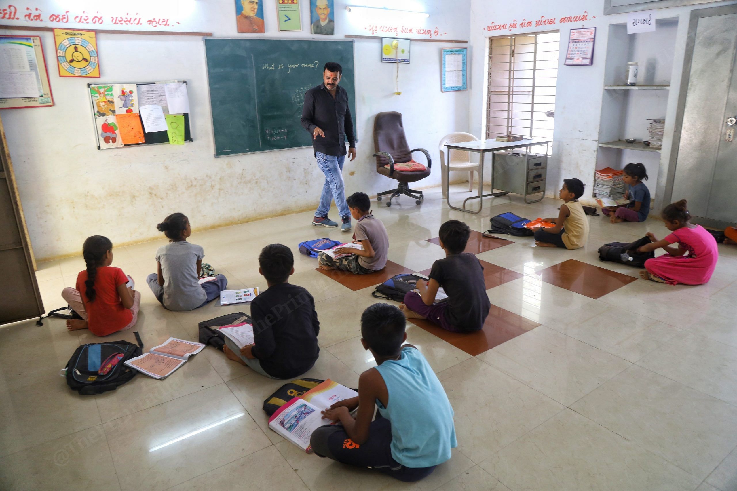 Vijay Kumar Patel teaches a combined class of students from classes four and five at the Angiya Nana primary school | Manisha Mondal | ThePrint