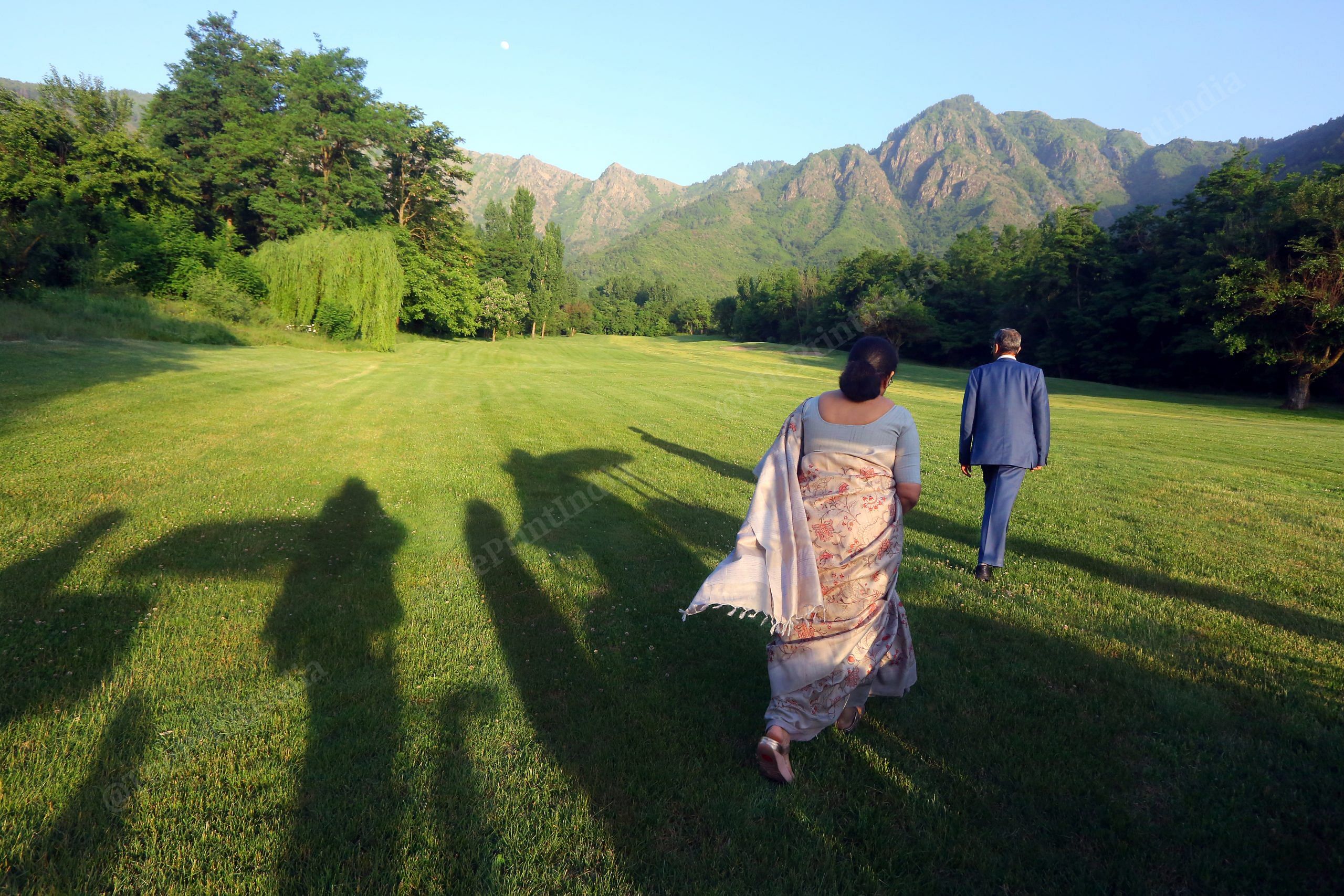 Chief Justice of India N. V. Ramana walks towards the Royal Springs Golf Course in Srinagar with wife Sivamala | Photo: Praveen Jain | ThePrint