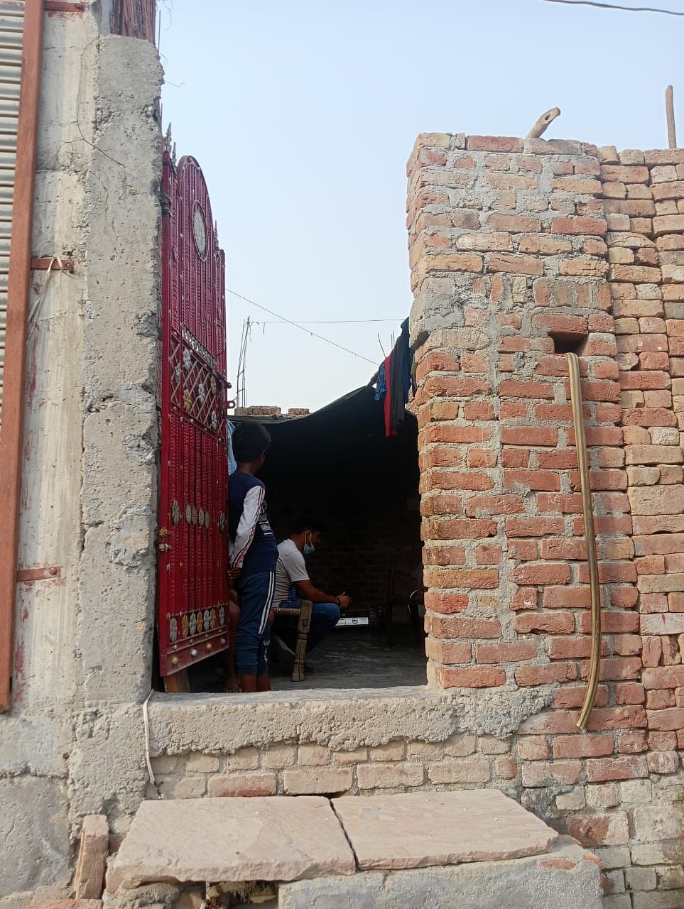 The entrance to the Prajapati family's house at Om Sai City Colony in Noida’s Sector 121 | Mohana Basu | ThePrint