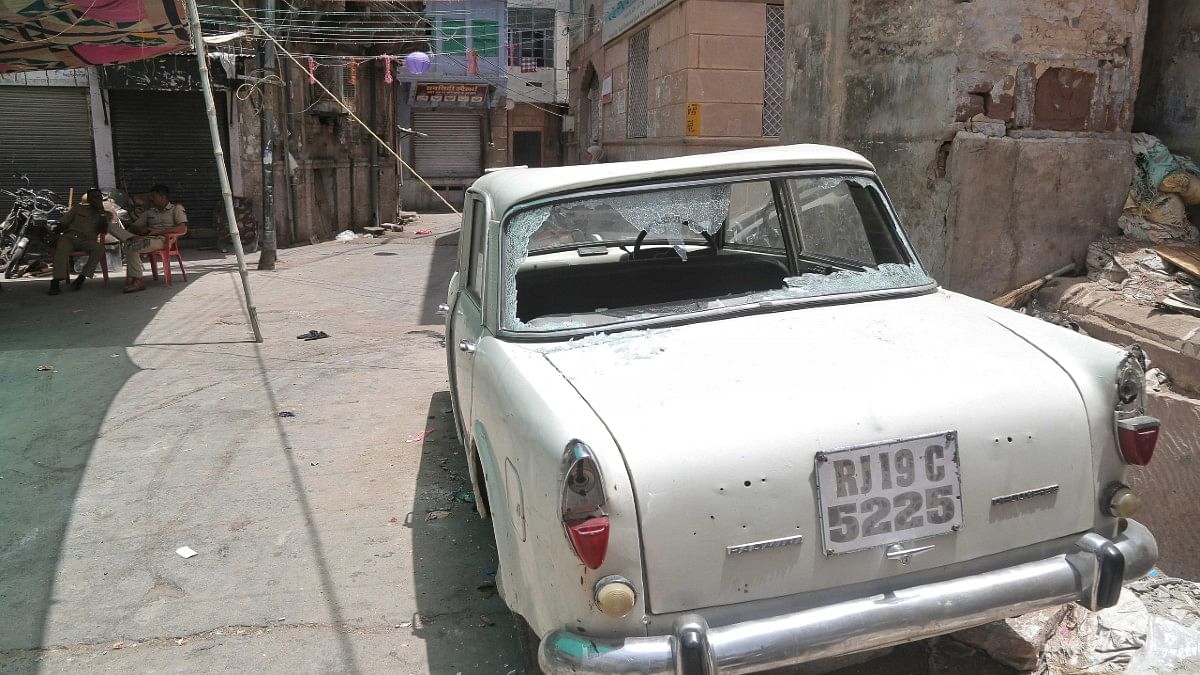 A car with a broken windshield at Jalori Gate in Jodhpur | Suraj Singh Bisht | ThePrint
