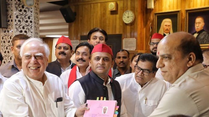 Kapil Sibal (L), along with Samajwadi Party chief Akhilesh Yadav, filing his Rajya Sabha nomination on 25 May 2022