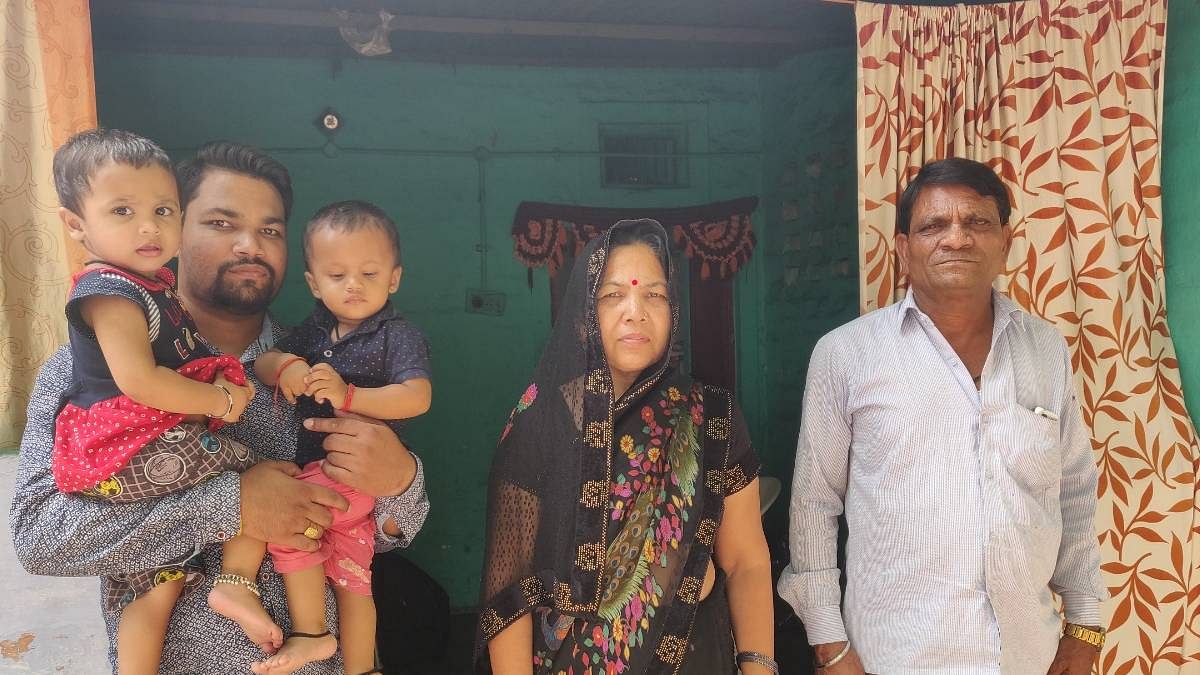 Rinku Singh's brother Muku (left), mother Veena Devi and father Khanchandra | Photo: Raghav Bikhchandani