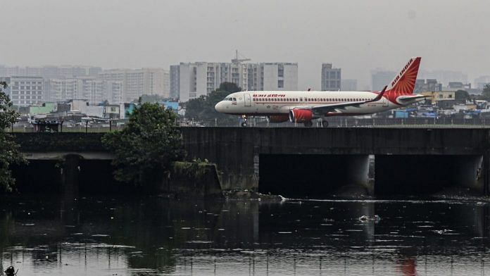 An Air India aircraft prepares to depart from Chhatrapati Shivaji Maharaj International Airport in Mumbai | Bloomberg