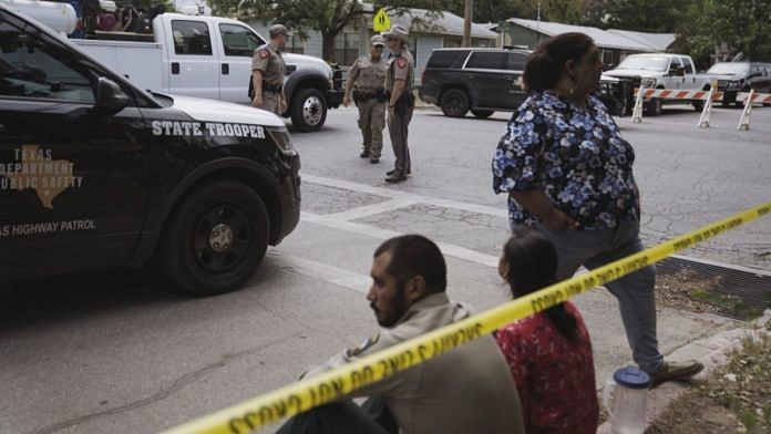 Police officers outside Robb Elementary School in Uvalde, Texas, where an 18-year-old gunman opened fire, killing 19 children and two teachers | Bloomberg