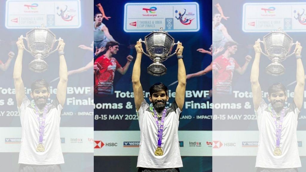 Srikanth Kidambi poses with the trophy after the Indian badminton team won the Thomas Cup 2022, in Bangkok Sunday