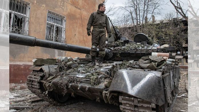 Representational image | A Russian soldier stands atop hit T-80 MBT in a position close to Mariupol's embattled Azovstal plant | Photographer: SOPA Images/LightRocket/Getty Images via Bloomberg