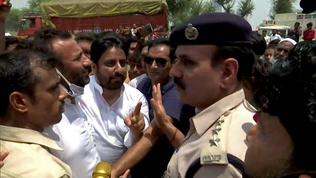 AAP MLA Amanatullah Khan at a protest against a demolition drive in the Madanpur Khadar area Thursday, where he was later arrested | Photo: ANI