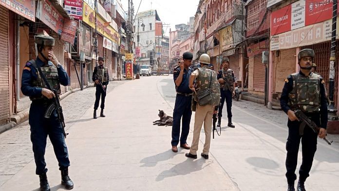 Security personnel near the Kashi Vishwanath Temple-Gyanvapi Mosque complex in Varanasi Monday, when the court-mandated videography survey in the mosque premises was completed | ANI