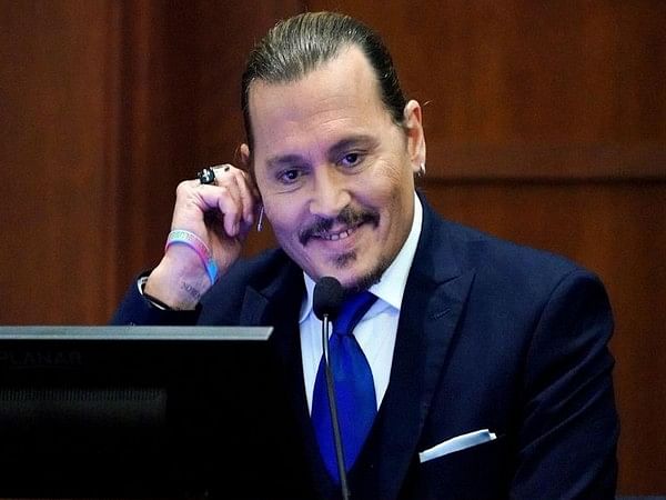 Johnny Depp laughs in court after bodyguard is asked if he saw actor's genitals