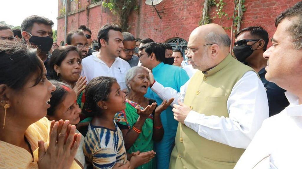Home Minister Amit Shah at the deceased's residence last week | By special arrangement