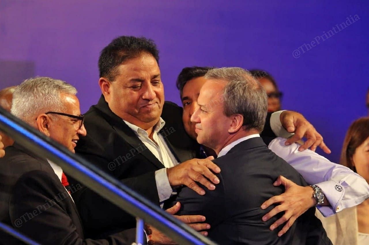 FIDE president Arkady Dvorkovich hugs the members | Photo: Praveen Jain | ThePrint