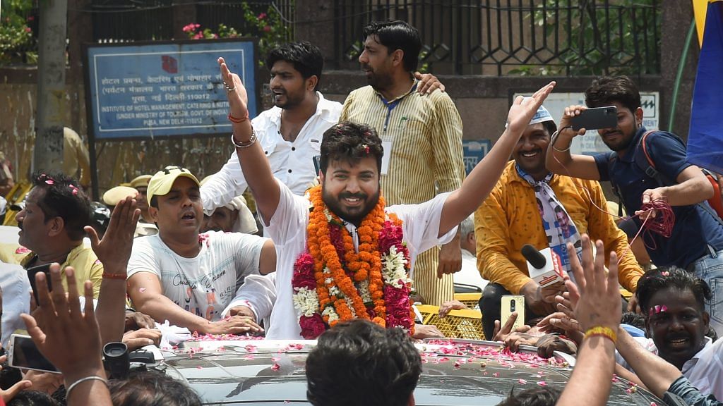 Aam Aadmi Party's Durgesh Pathak celebrates after winning the Rajendra Nagar assembly bypoll in New Delhi on 26 June 2022 | PTI Photo