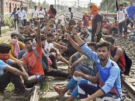 Youngsters sit on railway tracks in Bihar to protest against the Agnipath scheme | PTI