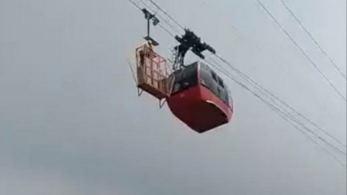 The stranded cable car in Himachal Pradesh's Parwanoo Monday | ANI