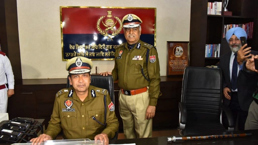 File photo of former Punjab Police chief Dinkar Gupta (seated) who is now the NIA chief | Twitter | @PunjabPoliceInd