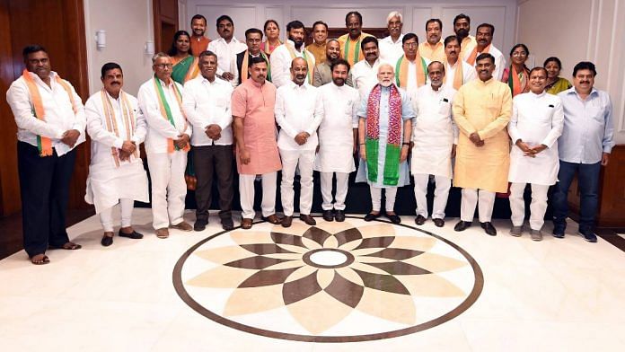 PM Narendra Modi with BJP corporators and party leaders from Telangana in Delhi on 7 June | Twitter | @narendramodi