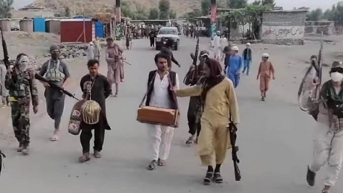 Taliban parading local Afghan musicians who performed in a wedding | Photo: @AnisBashir2 | Twitter