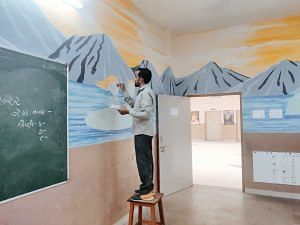 Painter at work in Mahatma Gandhi Prathmik Vidyalaya, Surat | Shubhangi Misra | ThePrint