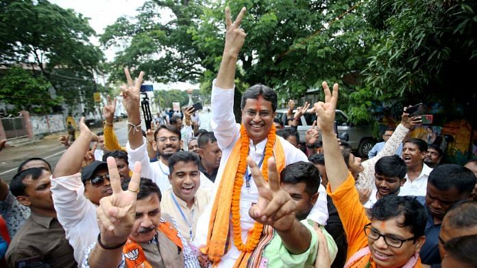 Tripura CM Manik Saha showing victory sign in Agartala after winning the assembly bypoll Sunday | ANI