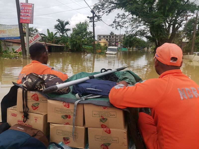 NDRF personnel with relief material leave for the outskirts of Silchar town | Angana Chakrabarti | ThePrint