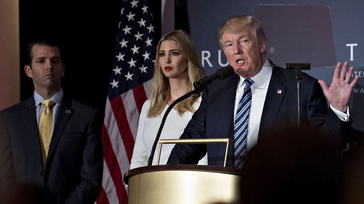 Donald Trump speaks as his daughter Ivanka Trump and son Donald Trump Jr., left, listen during a ceremony in Washington, DC, in 2016 | Bloomberg file photo