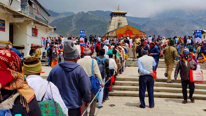 Devotees stand in a queue outside the Kedarnath Temple at Rudraprayag | ANI