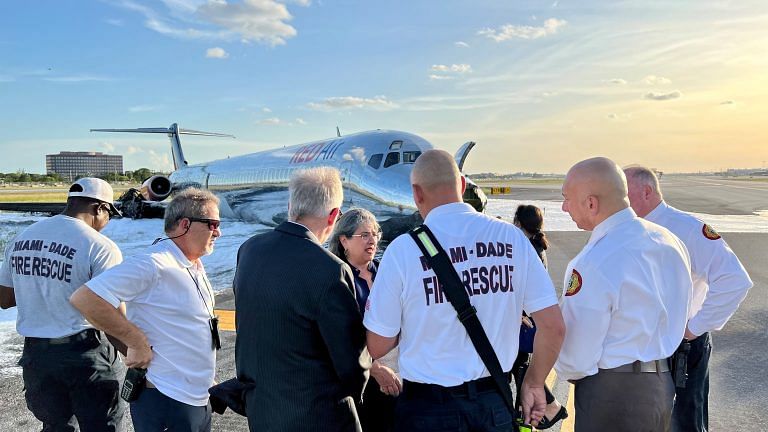 Plane carrying 126 on board catches fire upon landing at Miami airport, 3 hospitalised