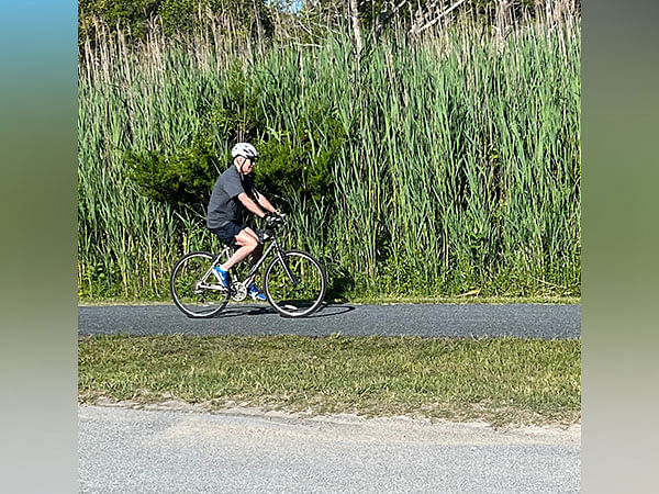 Biden falls off bike as he rides near beach home in Delaware 