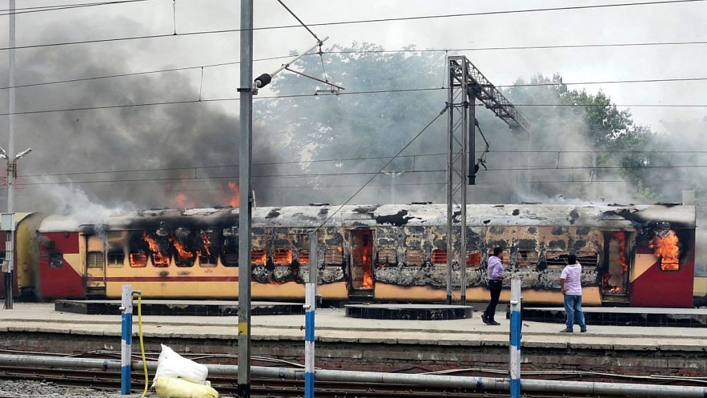 The Farakka Express was set on fire by youth protesting against the Centre's Agnipath recruitment scheme for the armed forces, at Danapur railway station Friday | ANI