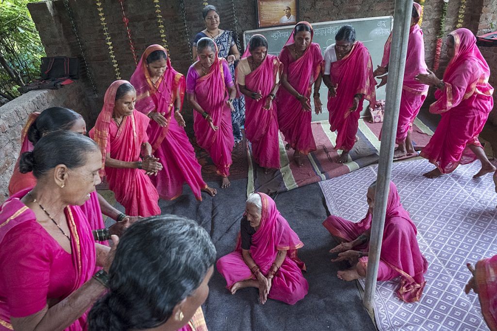 All women get up and perform a rhythmic dance in a circle while singing and clapping their hands. Sitabai Bandhu Deshmukh, 85, is unable to dance because of arthritis and so she sits at the centre of the circle | Jayati Saha