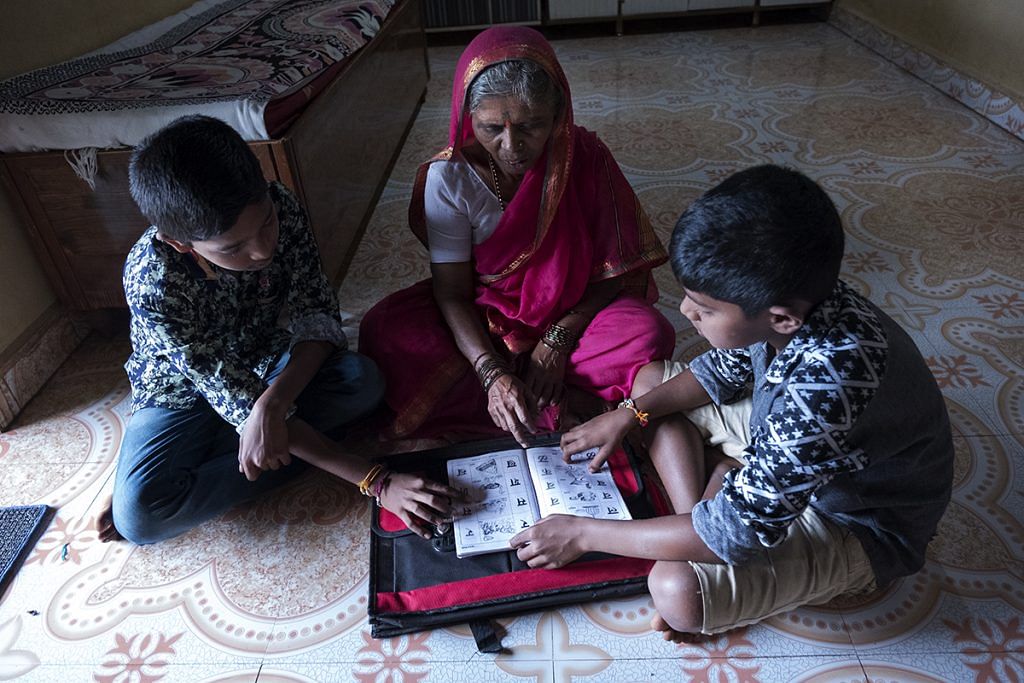 Kantabai is very serious about her homework and right after she returns home, her grandsons sit down with her and help her with it | Jayati Saha