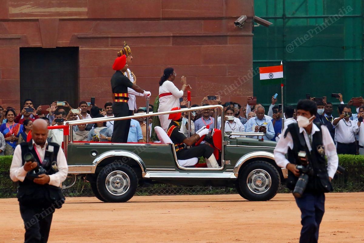 President Murmu waves at the employees of the Rashtrapati Bhawan | Photo: Praveen Jain | ThePrint