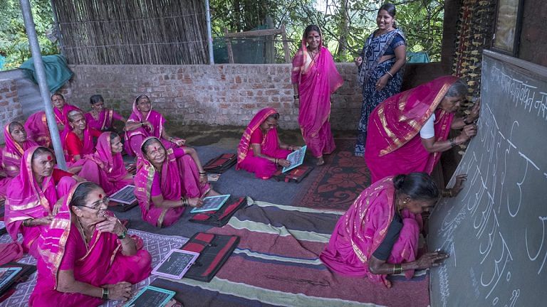 Maharashtra grandmothers are going to school, in pink saris, singing nursery rhymes