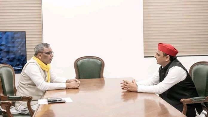 File photo of SBSP chief O.P. Rajbhar with SP chief Akhilesh Yadav | PTI