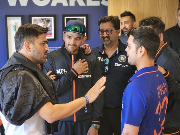 MS Dhoni interacts with Indian players after win over England in 2nd T20I