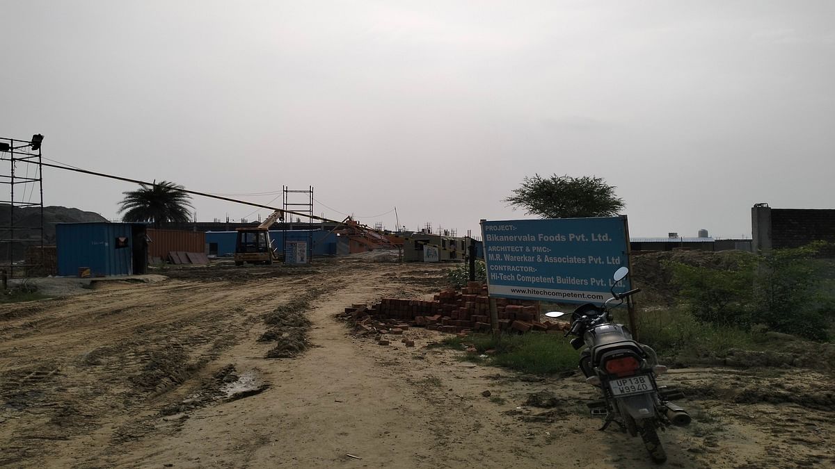 A board outside the construction site for Haldiram's and Bikanervala foods in Sector 30 | Tine Das | ThePrint