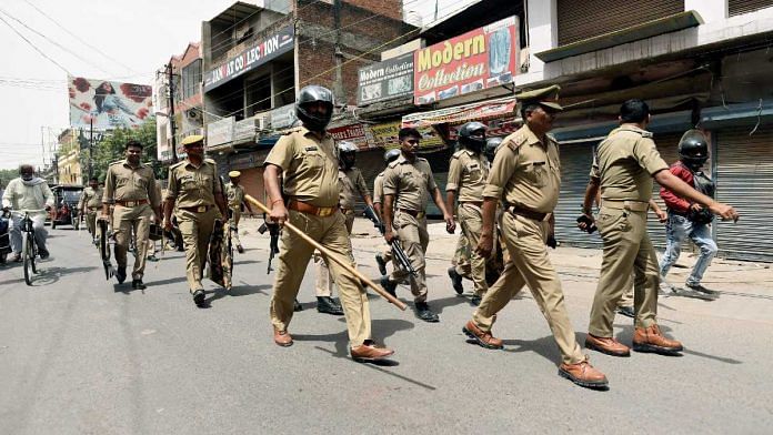 Police personnel march in Prayagraj last month after clashes during a protest over the remarks of suspended BJP leader Nupur Sharma over Prophet Mohammed | Representational image | ANI