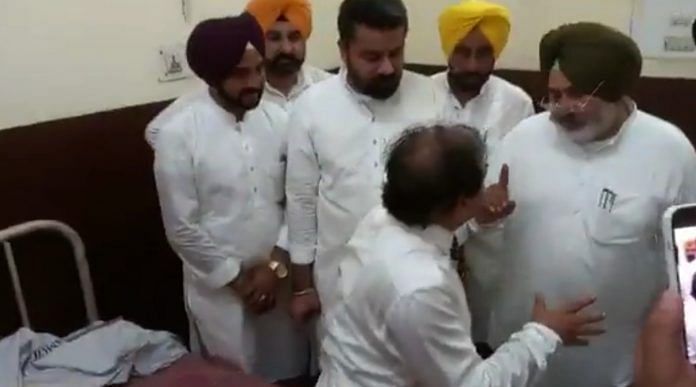 Still from viral video of interaction between Punjab health minister and V-C of Guru Gobind Singh Medical College & Hospital, Faridkot | Twitter @ANI